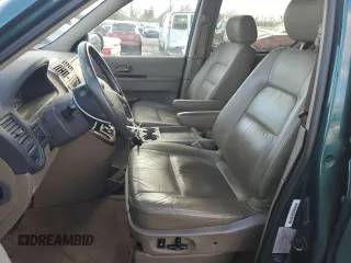 2002 Kia Sedona LX with VIN KNDUP131426217512, listed as a Copart auction lot 80928774 with 163,176 mi miles and Salvage Title. Bid and sale history available at carsss.com. Image 7.