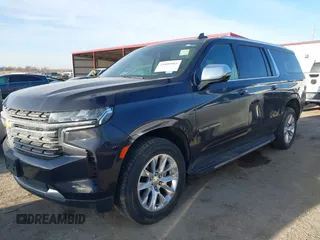 2023 Chevrolet Suburban Premier z VIN 1GNSKFKD0PR135739, wystawiony jako IAAI lot #41808983 z przebiegiem 64 683 mil mil oraz . Historia ofert i sprzedaży dostępna na DreamBid. Obrazek 2.