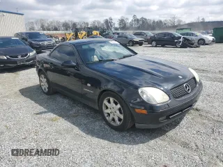 1999 Mercedes-Benz SLK-Class with VIN WDBKK47F2XF102927, listed as a Copart auction lot 50265585 with 184,918 mi miles and Salvage Title. Bid and sale history available at carsss.com. Image 4.