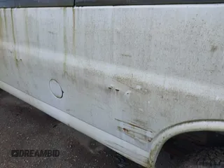 1997 GMC Savana z VIN 1GTGG29R2V1095122, wystawiony jako IAAI lot #42228877 z przebiegiem 120 646 mil mil oraz . Historia ofert i sprzedaży dostępna na DreamBid. Obrazek 13.