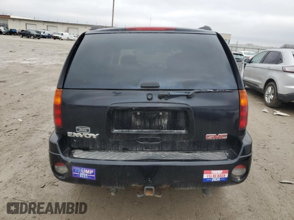 2005 GMC Envoy SLT with VIN 1GKDT13S952165475, listed as a Copart auction lot 44102465 with 0 mi miles and Salvage Title. Bid and sale history available at carsss.com. Image 6.