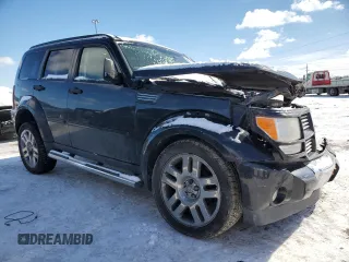 2010 Dodge Nitro Heat with VIN 1D4PU4GK4AW165374, listed as a Copart auction lot 45667655 with 142,086 mi miles and Salvage title. Bid and sale history available at DreamBid. Image 4.