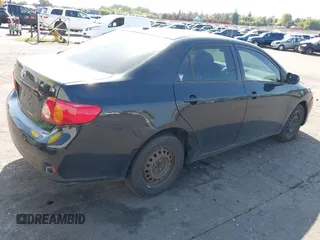 2009 Toyota Corolla with VIN JTDBL40E899046607, listed as a IAAI auction lot 42141452 with 204,769 mi miles. Bid and sale history available at carsss.com. Image 4.