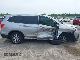 2021 Honda Pilot EX z VIN 5FNYF5H3XMB030112, wystawiony jako IAAI lot #42204148 z przebiegiem 96 182 mil mil oraz . Historia ofert i sprzedaży dostępna na DreamBid. Obrazek 14.