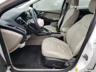 2015 Ford Focus Electric z VIN 1FADP3R41FL232835, wystawiony jako Copart lot #70969312 z przebiegiem 39 606 mil mil oraz . Historia ofert i sprzedaży dostępna na DreamBid. Obrazek 7.