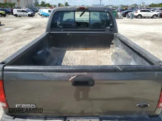 2002 Ford F-250 XL with VIN 1FTNW20F12EB93947, listed as a Copart auction lot 77836054 with 322,030 mi miles and Salvage Title. Bid and sale history available at DreamBid. Image 6.