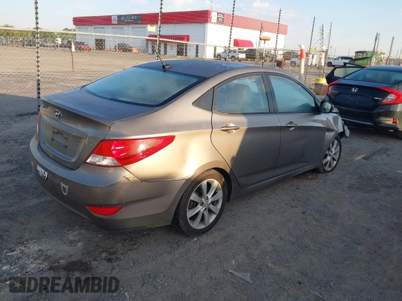 2012 Hyundai Accent GLS with VIN KMHCU4AE4CU097425, listed as a IAAI auction lot 42052740 with 244,705 mi miles. Bid and sale history available at carsss.com. Image 4.
