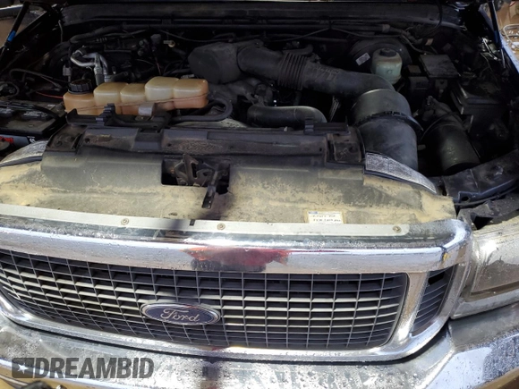 2000 Ford Excursion Limited with VIN 1FMNU43SXYEA13878, listed as a Copart auction lot 54050075 with 194,329 mi miles and Salvage title. Bid and sale history available at DreamBid. Image 11.