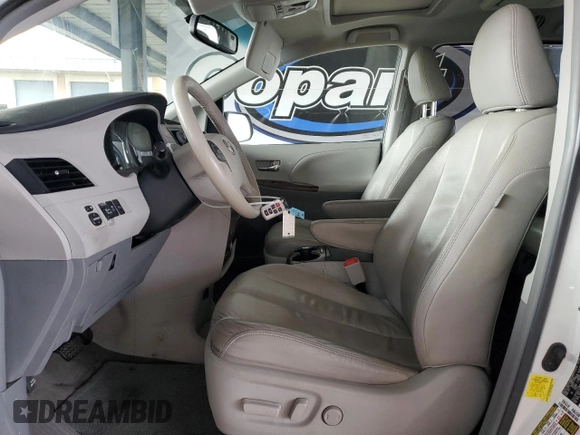 2012 Toyota Sienna XLE AAS with VIN 5TDYK3DC7CS275496, listed as a Copart auction lot 62612815 with 130,027 mi miles and Salvage title. Bid and sale history available at DreamBid. Image 7.