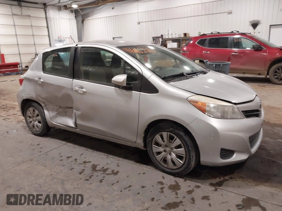2012 Toyota Yaris L with VIN JTDKTUD34CD523773, listed as a IAAI auction lot 41616220 with 77,332 mi miles. Bid and sale history available at carsss.com. Image 1.