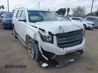 2015 GMC Yukon SLT with VIN 1GKS1BKC6FR109970, listed as a IAAI auction lot 41507467 with 115,309 mi miles. Bid and sale history available at carsss.com. Image 6.