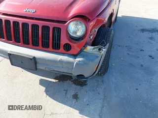 2005 Jeep Liberty Sport with VIN 1J4GL48K95W662399, listed as a IAAI auction lot 41900952 with 127,230 mi miles. Bid and sale history available at carsss.com. Image 6.
