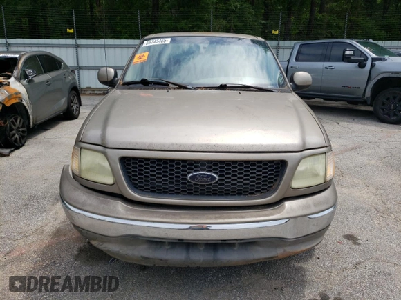 2003 Ford F-150 XL with VIN 1FTRX07213KD96765, listed as a Copart auction lot 53745465 with 292,863 mi miles and Salvage title. Bid and sale history available at DreamBid. Image 5.