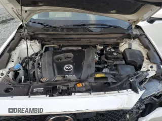 2020 Mazda CX-5 Touring with VIN JM3KFACM0L0863937, listed as a Copart auction lot 48240655 with 70,592 mi miles and Salvage Title. Bid and sale history available at carsss.com. Image 12.
