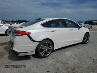 2017 Ford Fusion Titanium с VIN 3FA6P0K96HR161679, выставлен на аукционе Copart как лот 61237935 с пробегом 66 680 миль миль и Списание • Salvage title. История ставок и продаж доступна на DreamBid. Изображение 3.