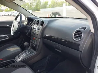 2014 Chevrolet Captiva Sport LS z VIN 3GNAL2EK0ES603331, wystawiony jako IAAI lot #42061441 z przebiegiem 128 041 mil mil oraz . Historia ofert i sprzedaży dostępna na DreamBid. Obrazek 5.