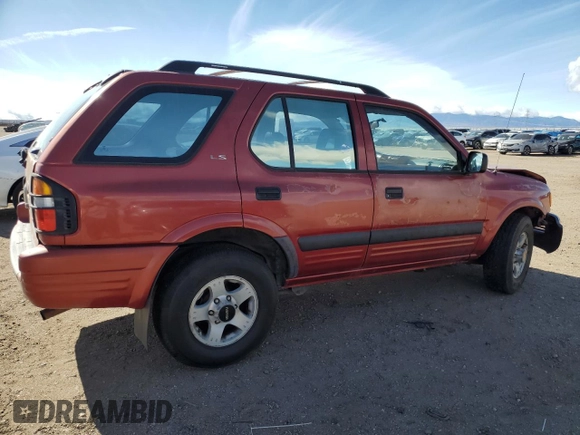 1999 Isuzu Rodeo S with VIN 4S2CM58WXX4318576, listed as a Copart auction lot 44378265 with 258,981 mi miles and Salvage Title. Bid and sale history available at DreamBid. Image 3.
