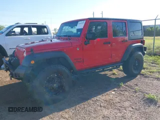 2015 Jeep Wrangler Unlimited Willys Wheeler with VIN 1C4BJWDG0FL635341, listed as a IAAI auction lot 41955393 with 145,529 mi miles and . Bid and sale history available at DreamBid. Image 2.