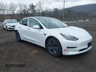 2021 Tesla Model 3 Standard Range Plus z VIN 5YJ3E1EA0MF857397, wystawiony jako IAAI lot #41917014 z przebiegiem 22 865 mil mil oraz . Historia ofert i sprzedaży dostępna na DreamBid. Obrazek 1.