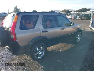 2004 Honda CR-V LX with VIN JHLRD68474C012546, listed as a IAAI auction lot 41288069 with 212,872 mi miles and . Bid and sale history available at DreamBid. Image 4.