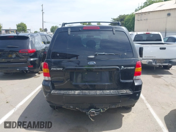 2006 Ford Escape Hybrid z VIN 1FMCU96H96KA25975, wystawiony jako IAAI lot #42130554 z przebiegiem 235 342 mil mil oraz . Historia ofert i sprzedaży dostępna na DreamBid. Obrazek 16.