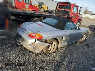 2000 Porsche Boxster z VIN WP0CA2980YU626179, wystawiony jako Copart lot #44728325 z przebiegiem 103 173 mil mil oraz Szkody całkowita. Historia ofert i sprzedaży dostępna na DreamBid. Obrazek 3.