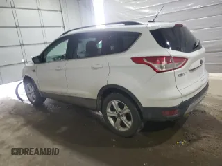2016 Ford Escape SE with VIN 1FMCU9GX0GUB42503, listed as a Copart auction lot 50174515 with 130,204 mi miles and Salvage Title. Bid and sale history available at DreamBid. Image 2.