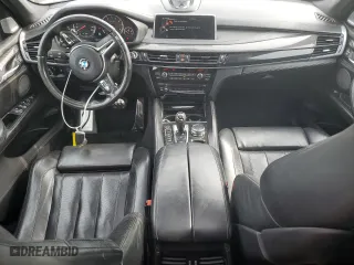 2016 BMW X5 M with VIN 5YMKT6C54G0R79100, listed as a Copart auction lot 55699044 with 106,772 mi miles. Bid and sale history available at carsss.com. Image 8.