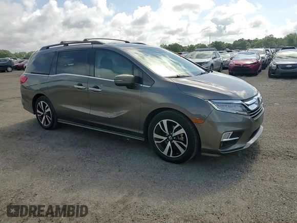 2019 Honda Odyssey Elite z VIN 5FNRL6H90KB027207, wystawiony jako Copart lot #60265905 z przebiegiem 69 313 mil mil oraz Szkoda całkowita • Salvage title. Historia ofert i sprzedaży dostępna na DreamBid. Obrazek 14.