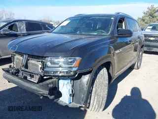 2019 Volkswagen Atlas SEL R-Line z VIN 1V2RR2CA6KC509913, wystawiony jako IAAI lot #41410198 z przebiegiem 97 681 mil mil oraz . Historia ofert i sprzedaży dostępna na DreamBid. Obrazek 19.
