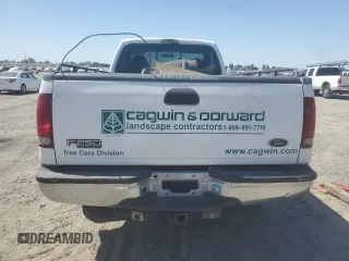 2000 Ford F-250 XL with VIN 1FTNF21F0YEC85459, listed as a Copart auction lot 63040505 with 328,049 mi miles and Salvage title. Bid and sale history available at DreamBid. Image 6.