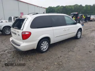 2006 Chrysler Town & Country Touring z VIN 2A4GP54L76R915853, wystawiony jako IAAI lot #42361966 z przebiegiem 250 782 mil mil oraz . Historia ofert i sprzedaży dostępna na DreamBid. Obrazek 4.