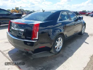 2008 Cadillac CTS RWD z VIN 1G6DJ577080174096, wystawiony jako IAAI lot #42237070 z przebiegiem 139 776 mil mil oraz . Historia ofert i sprzedaży dostępna na DreamBid. Obrazek 4.