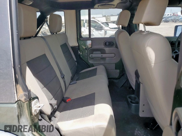 2008 Jeep Wrangler Unlimited X с VIN 1J4GA39128L537191, выставлен на аукционе Copart как лот 56844345 с пробегом 305 764 миль миль и Списание • Salvage title. История ставок и продаж доступна на DreamBid. Изображение 10.