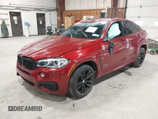 2018 BMW X6 xDrive35i z VIN 5UXKU2C59J0Z62359, wystawiony jako IAAI lot #41866547 z przebiegiem 57 544 mil mil oraz . Historia ofert i sprzedaży dostępna na DreamBid. Obrazek 2.