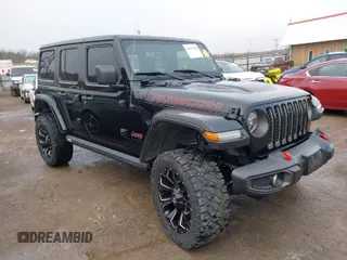 2021 Jeep Wrangler Unlimited Rubicon with VIN 1C4HJXFG2MW628559, listed as a IAAI auction lot 41193146 with 56,474 mi miles. Bid and sale history available at carsss.com. Image 1.