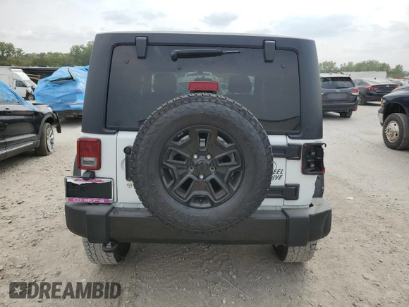 2016 Jeep Wrangler Willys Wheeler z VIN 1C4AJWAG7GL297695, wystawiony jako Copart lot #70838414 z przebiegiem 82 813 mil mil oraz Szkoda całkowita • Salvage title. Historia ofert i sprzedaży dostępna na DreamBid. Obrazek 6.