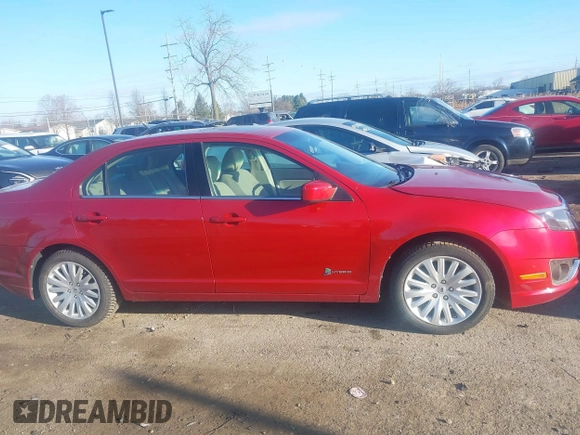2011 Ford Fusion Hybrid with VIN 3FADP0L3XBR342051, listed as a IAAI auction lot 41880330 with 118,776 mi miles and . Bid and sale history available at DreamBid. Image 13.