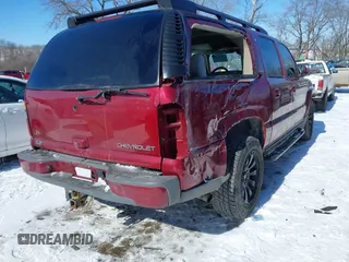 2004 Chevrolet Suburban Z71 with VIN 3GNFK16Z84G231091, listed as a IAAI auction lot 41595885 with 101,243 mi miles. Bid and sale history available at carsss.com. Image 4.