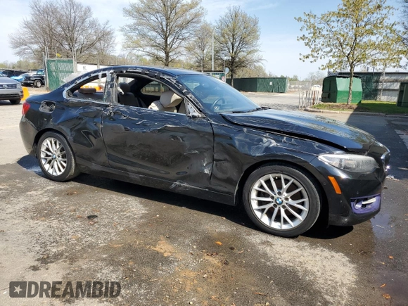 2016 BMW 2 Series 228i xDrive with VIN WBA1G9C53GV726361, listed as a Copart auction lot 52110745 with 88,939 mi miles and Clean title. Bid and sale history available at DreamBid. Image 4.