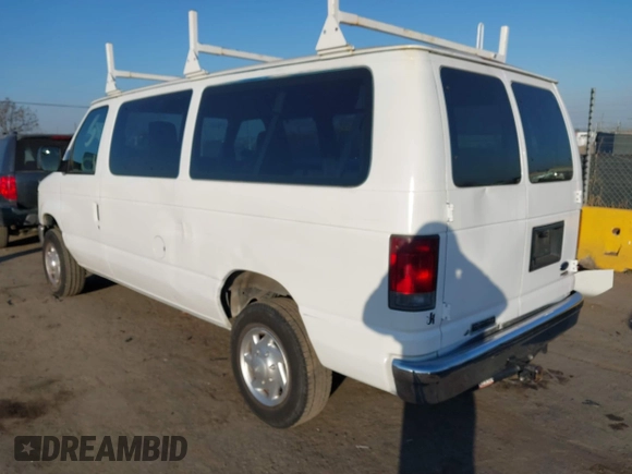 2011 Ford Econoline Passenger XL with VIN 1FBNE3BL0BDA75121, listed as a IAAI auction lot 41469640 with 105,558 mi miles. Bid and sale history available at carsss.com. Image 3.