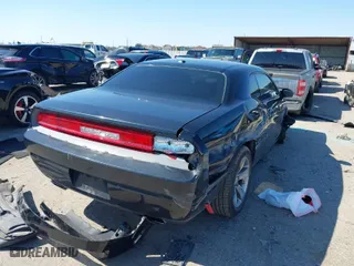 2014 Dodge Challenger SXT with VIN 2C3CDYAGXEH257685, listed as a IAAI auction lot 41626974 with 87,594 mi miles. Bid and sale history available at carsss.com. Image 4.