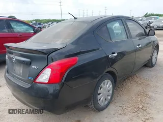 2014 Nissan Versa SV with VIN 3N1CN7AP1EL822984, listed as a IAAI auction lot 42124959 with 126,900 mi miles. Bid and sale history available at carsss.com. Image 4.