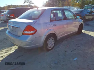 2011 Nissan Versa S with VIN 3N1BC1AP3BL450476, listed as a IAAI auction lot 40925098 with 158,922 mi miles and . Bid and sale history available at DreamBid. Image 4.
