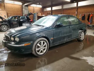 2004 Jaguar X-Type z VIN SAJEB52D54XD98806, wystawiony jako Copart lot #52204795 z przebiegiem 165 440 mil mil oraz Szkoda całkowita • Salvage title. Historia ofert i sprzedaży dostępna na DreamBid. Obrazek 1.
