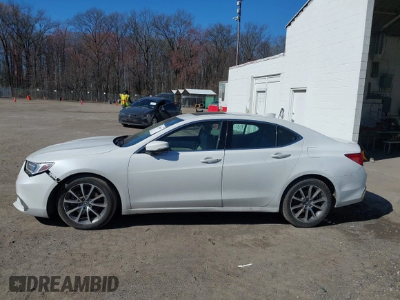2019 Acura TLX with VIN 19UUB2F33KA003854, listed as a IAAI auction lot 41808917 with 95,380 mi miles and . Bid and sale history available at DreamBid. Image 14.