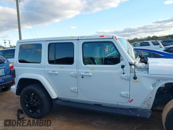 2021 Jeep Wrangler Unlimited Sahara with VIN 1C4JJXP64MW840094, listed as a IAAI auction lot 40830676 with 31,716 mi miles and . Bid and sale history available at DreamBid. Image 14.