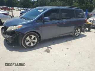 2015 Toyota Sienna LE AAS with VIN 5TDKK3DC2FS651385, listed as a Copart auction lot 62451275 with 166,610 mi miles and Salvage title. Bid and sale history available at DreamBid. Image 1.