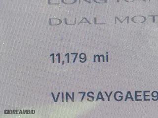 2023 Tesla Model Y Long Range with VIN 7SAYGAEE9PF905943, listed as a IAAI auction lot 41444255 with 11,179 mi miles. Bid and sale history available at carsss.com. Image 14.