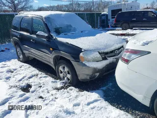 2003 Mazda Tribute LX with VIN 4F2YZ941X3KM49680, listed as a IAAI auction lot 41361388 with Not Provided miles. Bid and sale history available at carsss.com. Image 1.